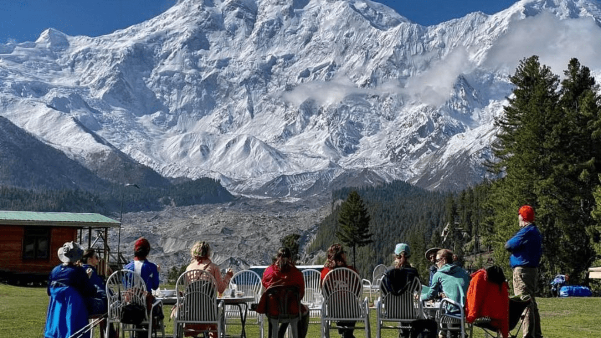 Majestic mountain peaks under a clear blue sky in northern Pakistan.